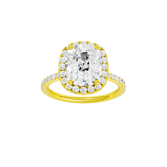 Elongated cushion-cut diamond engagement ring with a prong-set diamond band and halo setting.