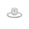 Elongated cushion-cut diamond engagement ring with a prong-set diamond band and halo setting.