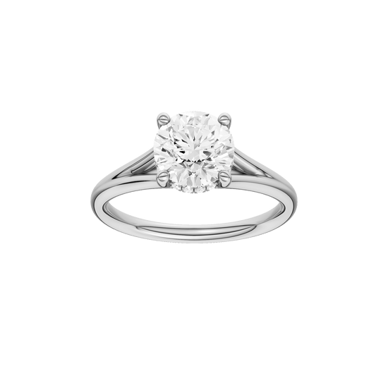 Round-cut diamond engagement ring with a plain band and hidden-halo setting.
