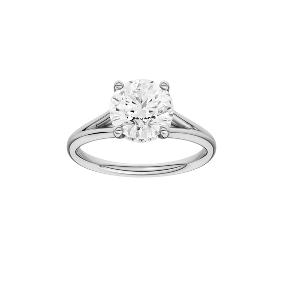 Round-cut diamond engagement ring with a plain band and hidden-halo setting.