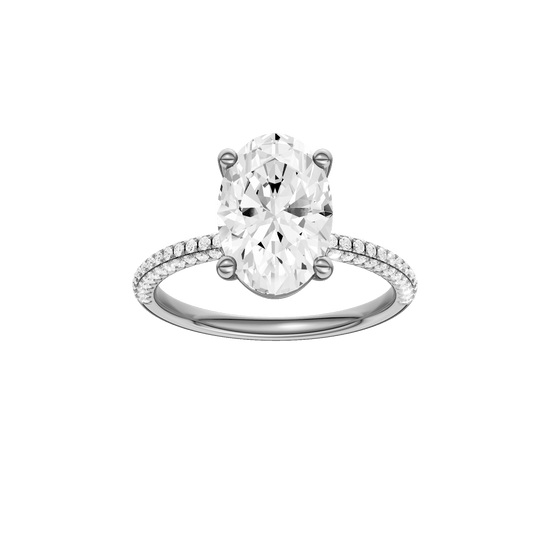 Oval-cut diamond engagement ring with a pavé-set diamond band and solitaire setting.