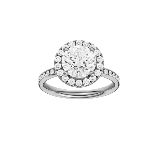 Round-cut diamond engagement ring with a channel-set diamond band and halo setting.
