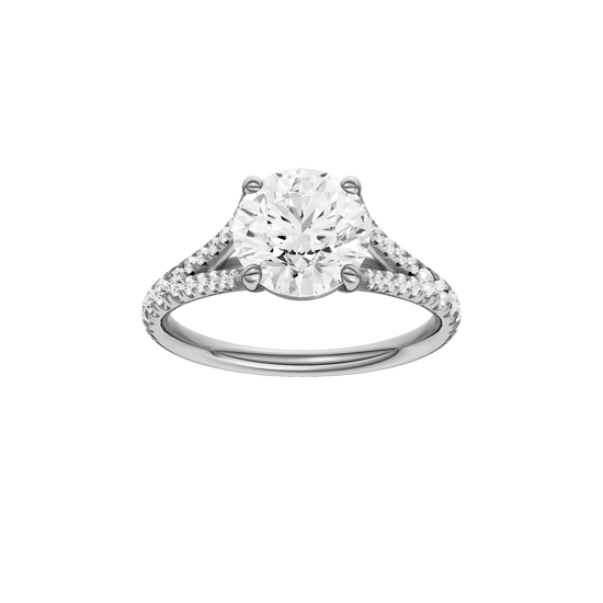 Round-cut diamond engagement ring with a prong-set diamond band and solitaire setting.