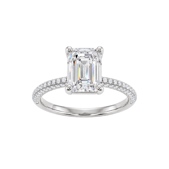 A front view of the Emerald cut diamond engagement ring in platinum with a prong diamond band and cathedral setting