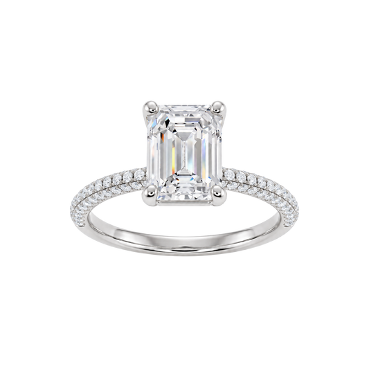 A front view of the Emerald cut diamond engagement ring in 14k white gold with a prong diamond band and cathedral setting