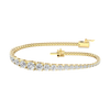 A full top-down view of a 14K yellow gold tennis bracelet, coiled to show the cascading line of round diamonds and the clasp.