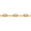 A close-up side view of a 14K yellow gold tennis bracelet, showing the line of square-cut diamonds and their setting.