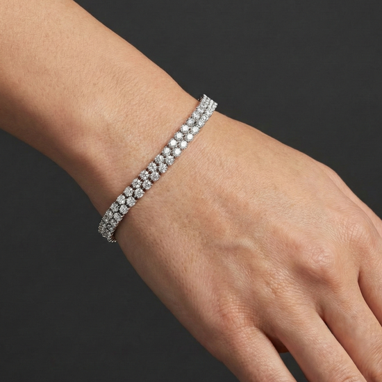 Petite 6-Carat Cluster Diamond Tennis Bracelet on a woman's wrist