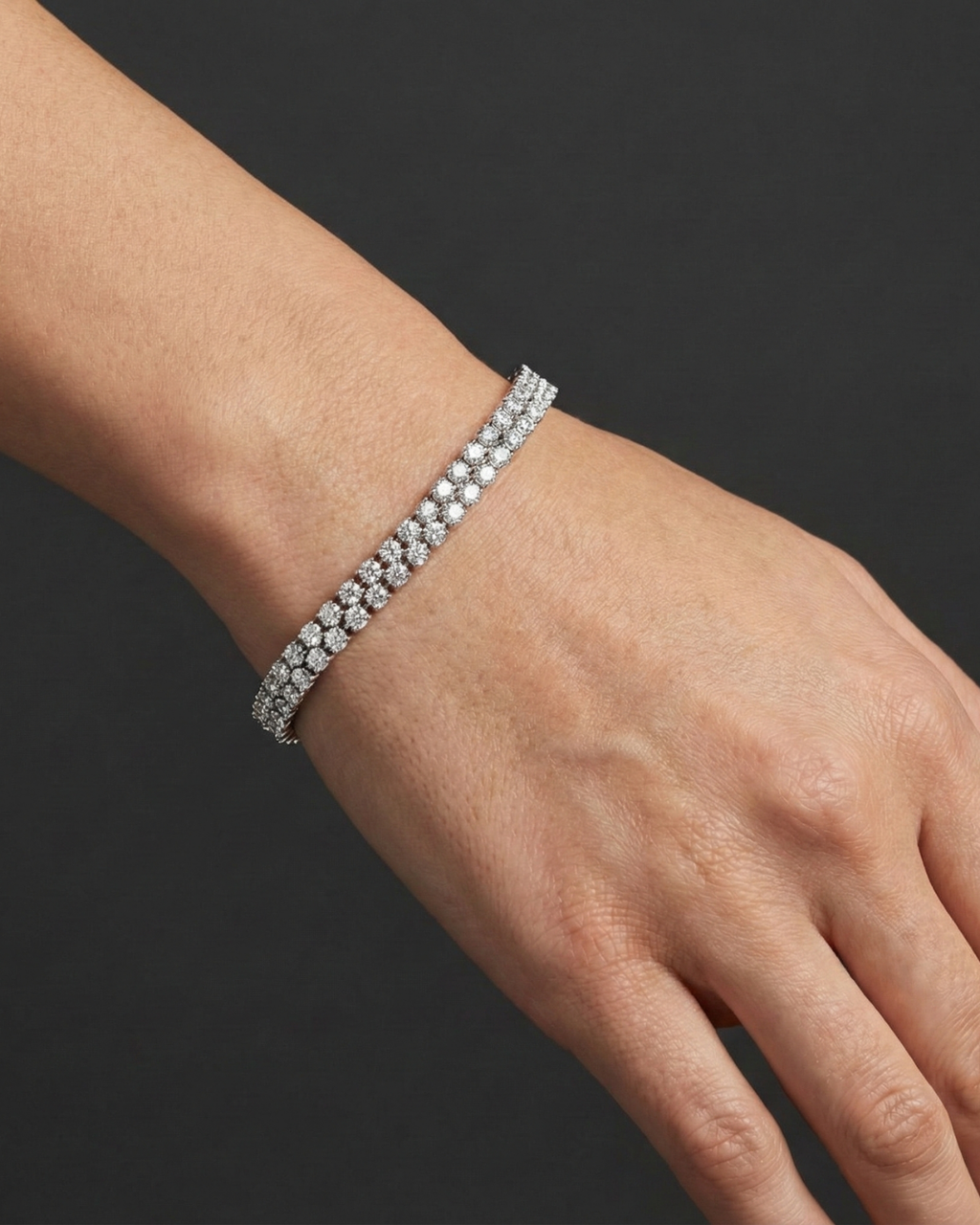 Petite 6-Carat Cluster Diamond Tennis Bracelet on a woman's wrist