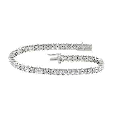 A full top-down view of a 14K white gold tennis bracelet, coiled to show the seamless, continuous line of round diamonds.