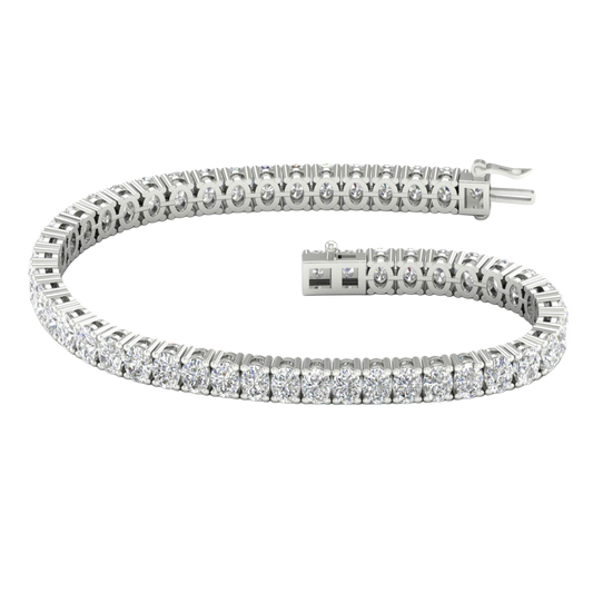 A full top-down view of a 14K white gold bracelet, coiled to show the bold, double-line of brilliant diamonds.