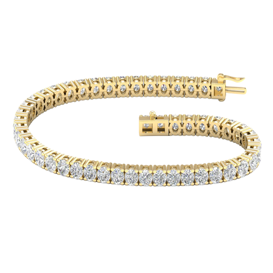 A full top-down view of a 14K yellow gold bracelet, coiled to show the bold, double-line of brilliant diamonds.