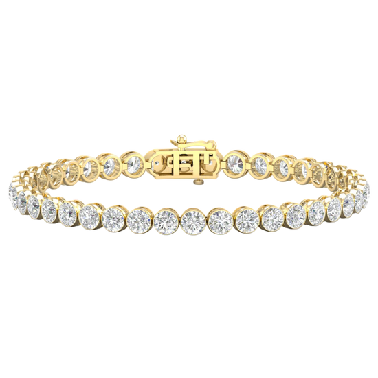 A full top-down view of a 14K yellow gold tennis bracelet, coiled to show the seamless circle of brilliant diamonds.