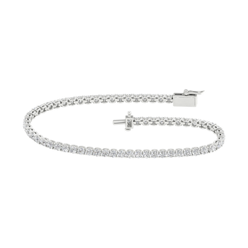 A full top view of the 14K white gold tennis bracelet, coiled to show the continuous, brilliant line of diamonds.
