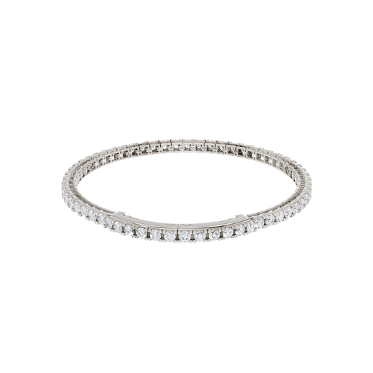 Angled view of the 14K white gold Round Diamond Tennis Bracelet, coiled to showcase the continuous line of lab grown diamonds.
