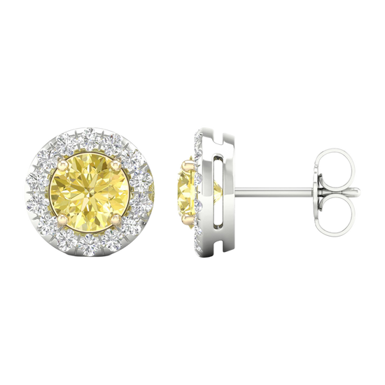 An angled and side view of a pair of 14K white gold stud earrings, with a with a 2 carat total weight VS+  yellow diamond at the center and a halo of white diamonds, showcasing the full design.