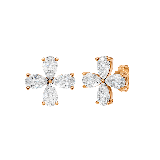 A front-facing product shot of a pair of rose gold or platinum flower stud earrings.