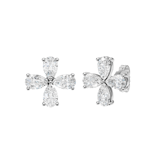A front-facing product shot of a pair of white gold or platinum flower stud earrings.