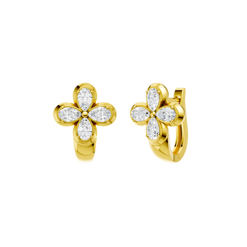 Angled view of yellow gold floral diamond huggie earrings highlighting warm gold tones, dimensional flower detailing, and diamond sparkle.