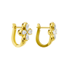 Back view of yellow gold floral diamond huggie earrings displaying polished gold metal, hinge detail, and clean structural design.