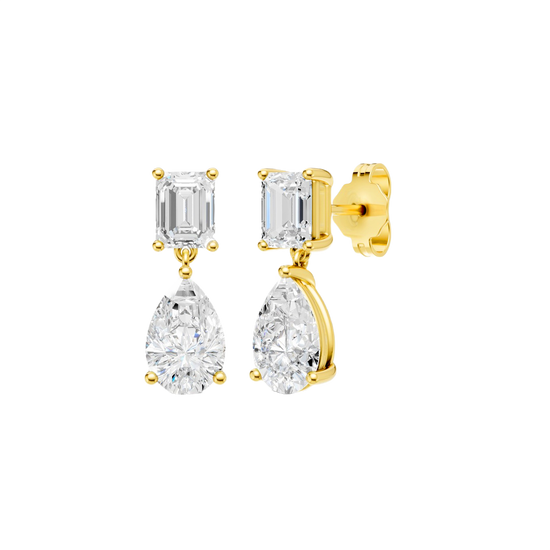 High-polish 14k yellow gold drop earrings by Amorati featuring a mismatched emerald-cut and pear-cut lab-grown diamond for a modern look.