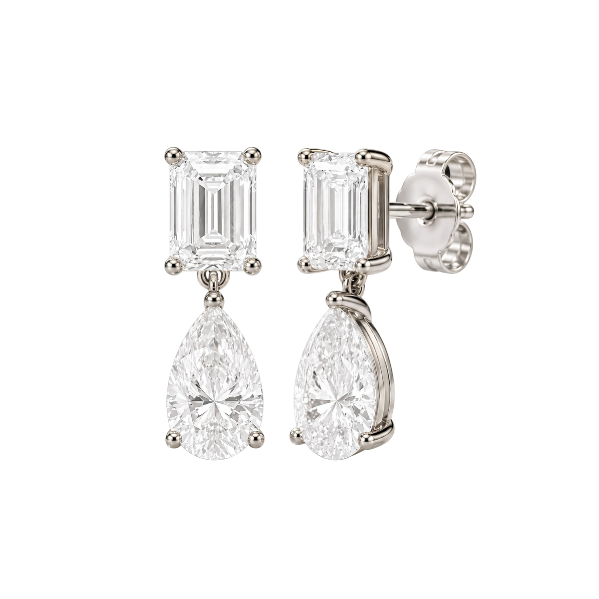 High-polish 14k white gold drop earrings by Amorati featuring a mismatched emerald-cut and pear-cut lab-grown diamond for a modern look.