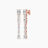 Amorati Diamond Multi-shape Diamond Drop Earrings. A pair of 14K rose gold drop earrings with lab grown diamond baguette, round, pear and marquise-cut diamonds, shown on a solid white background.