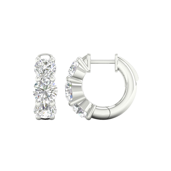 A front and side view of 14K white gold huggie hoop earrings, highlighting their wide double-row style.
