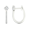 A profile view of a 14K white gold huggie hoop, showcasing the thin band and the drop design.