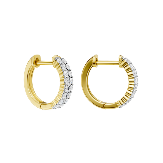 An angled view of a 14K yellow gold huggie hoop highlighting its wide double-row style.