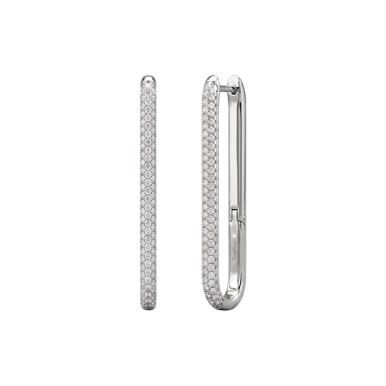 A front and profile view of 14K white gold long huggie hoops with a pavé diamond surface and angular corners.