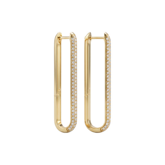 A side profile view of a 14K yellow gold huggie hoop, highlighting the linear design and the pavé diamonds.