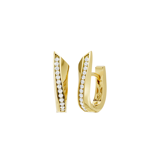 A front and angled view of a pair of 14K yellow gold huggie hoop earrings. The pavé diamonds are set in a diagonal line on the front surface, catching the light and highlighting the classic hoop shape.