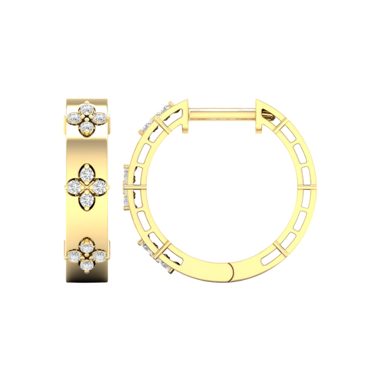 An angled view of a pair of 14K yellow gold huggie hoop earrings with a diamond floral design from the Amorati Collection. The hinge closure is visible.