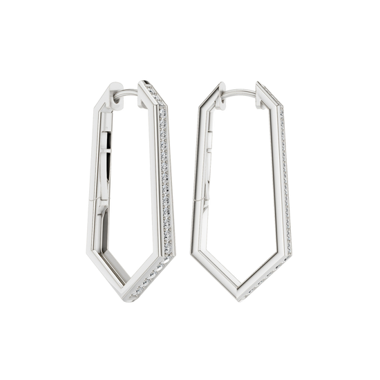 A side-angled view of a pair of 14K white gold oval huggie hoops, showing the line of diamonds and the hinged closure.