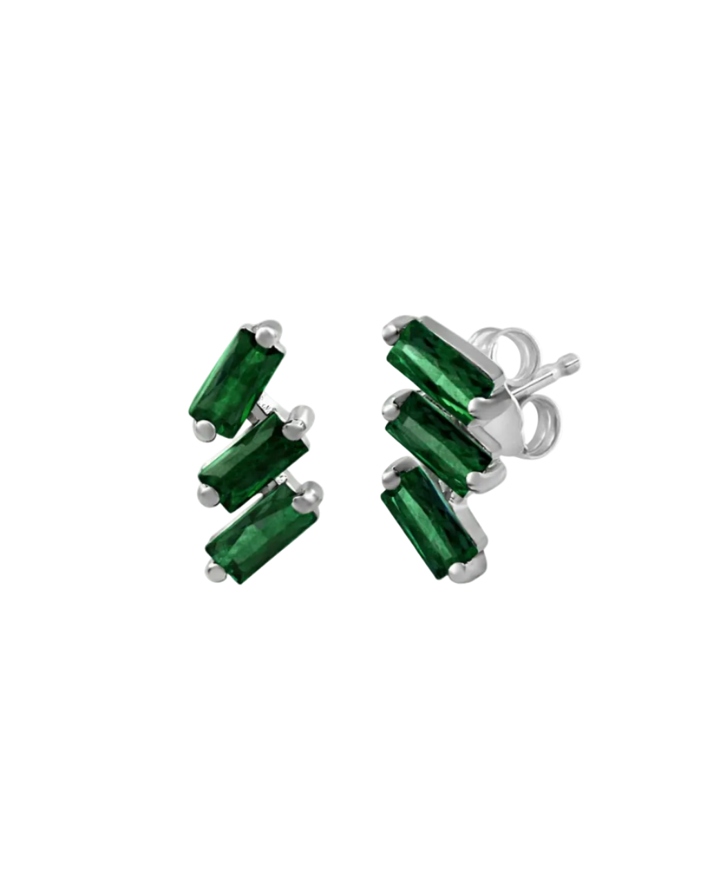 A pair of cascading stud earrings featuring a vertical arrangement of three baguette-cut emeralds in a deep, saturated green. The rectangular gemstones are staggered in a step-like formation and held in a minimalist 18k white gold setting, shown against a clean, white studio background.