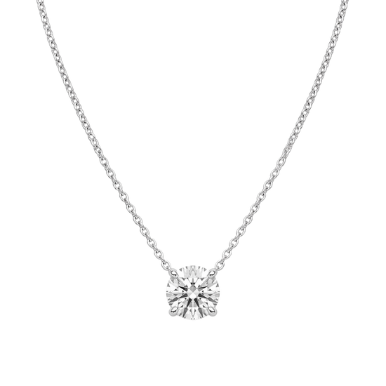 Product shot of a delicate silver-tone chain necklace featuring a brilliant round-cut clear gemstone in a four-prong setting, displayed against a white background.