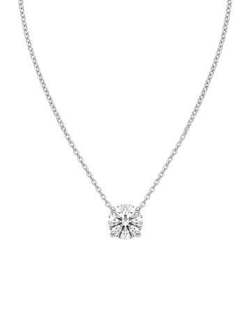Product shot of a delicate silver-tone chain necklace featuring a brilliant round-cut clear gemstone in a four-prong setting, displayed against a white background.