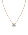 Product shot of a delicate yellow-tone chain necklace featuring a brilliant round-cut clear gemstone in a four-prong setting, displayed against a white background.