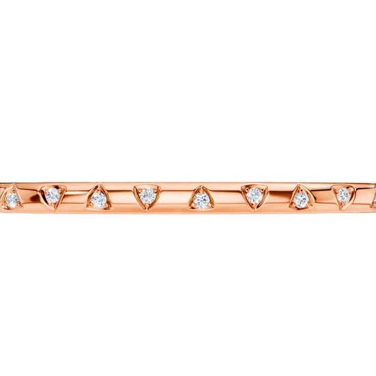 A sleek, high-polish 14k rose gold bangle from the Amorati Fourteen Collection, featuring scattered star insets with shimmering round lab-grown diamonds.
