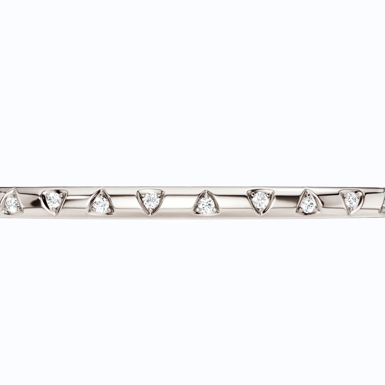 A sleek, high-polish 14k white gold bangle from the Amorati Fourteen Collection, featuring scattered star insets with shimmering round lab-grown diamonds.