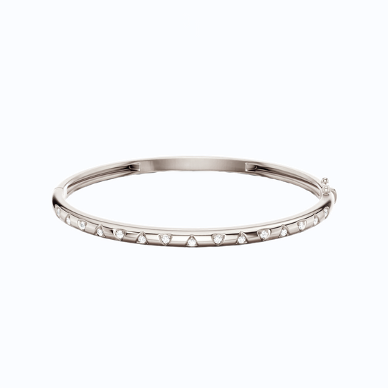 A sleek, high-polish 14k white gold bangle from the Amorati Fourteen Collection, featuring scattered star insets with shimmering round lab-grown diamonds.