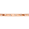 A substantial, high-polish 14k rose gold wide cuff from the Amorati Fourteen Collection, featuring scattered star and geometric insets with shimmering round lab-grown diamonds.