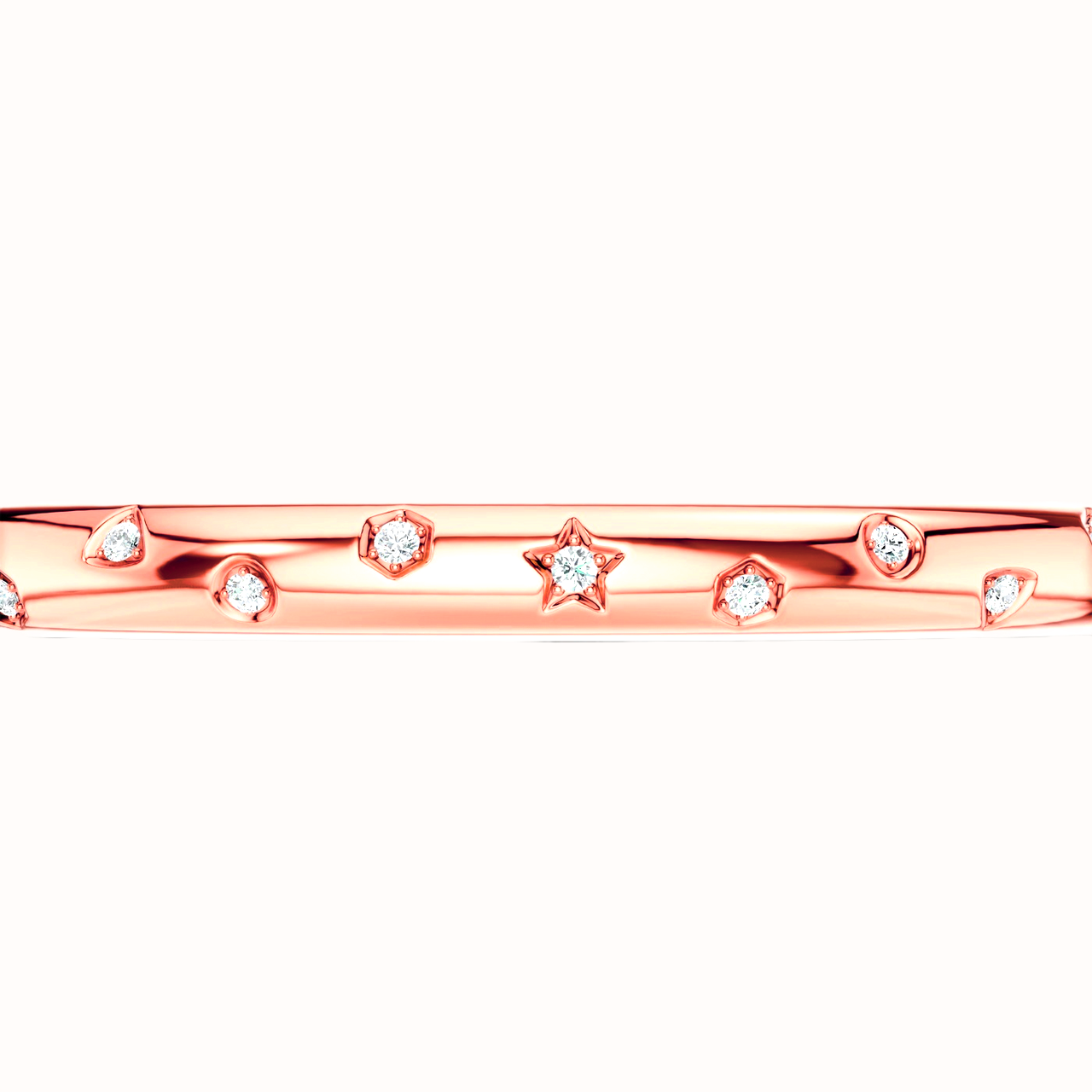 Amorati Diamonds Multi Shape Studded Diamond Bangle in 14K rose gold. The bracelet featuring a row of small star, triangles and other shapes inset with round lab grown diamonds, shown against a plain white background.