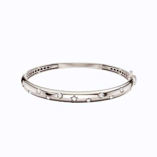 Amorati Diamonds Multi Shape Studded Diamond Bangle in 14K white gold. This bracelet with small round lab grown diamonds set along the front, displayed on a clean white background.