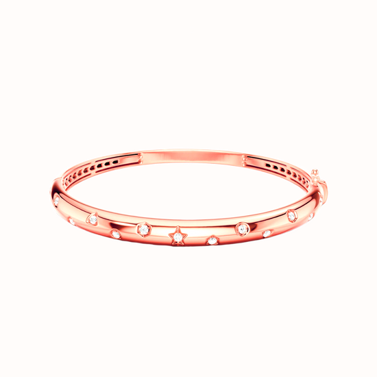 Amorati Diamonds Multi Shape Studded Diamond Bangle in 14K rose gold. This bracelet with small round lab grown diamonds set along the front, displayed on a clean white background.