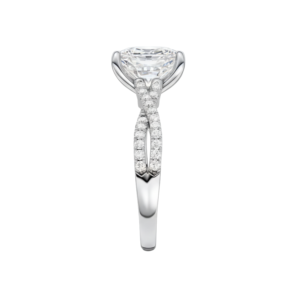 A side view of the Elongated Cushion diamond engagement ring in 14k white gold with a prong diamond band and cathedral setting