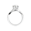 A profile view of the Elongated Cushion diamond engagement ring in 14k white gold with a prong diamond band and cathedral setting