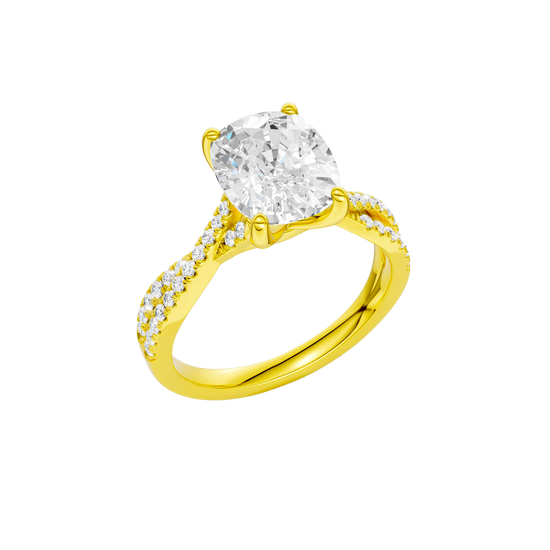 A three-quarter view of the Elongated Cushion diamond engagement ring in 14k yellow gold with a prong diamond band and cathedral setting
