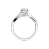 A side profile view of 14K white gold Amorati Vignette oval diamond solitaire with prong setting and diamond band